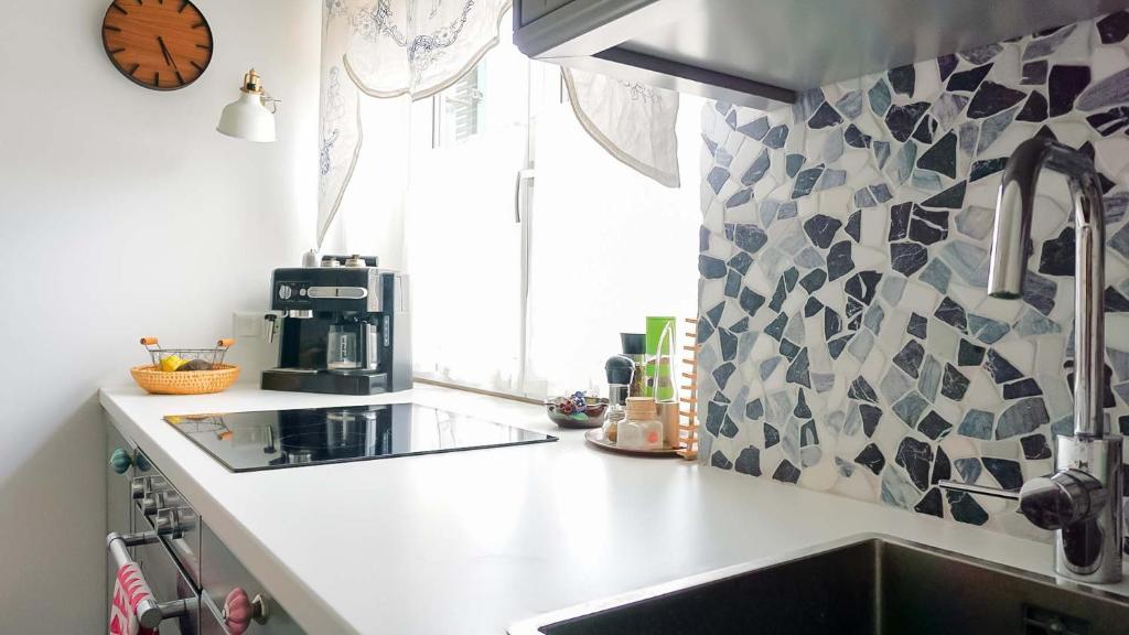 A kitchen or kitchenette at Urlaub am Kinispa