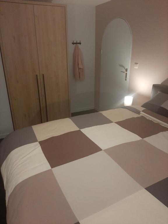 Postel nebo postele na pokoji v ubytování Le Tri Bèneu