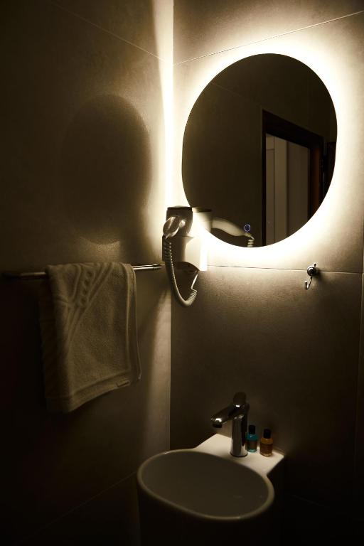 Koupelna v ubytování Amico Hotel