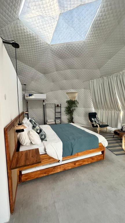 Letto o letti in una camera di Starry Domes Desert Camp