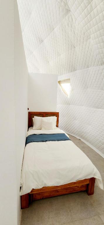 Letto o letti in una camera di Starry Domes Desert Camp