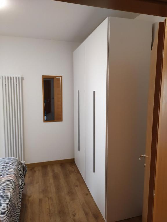 Łóżko lub łóżka w pokoju w obiekcie Casa Mirella