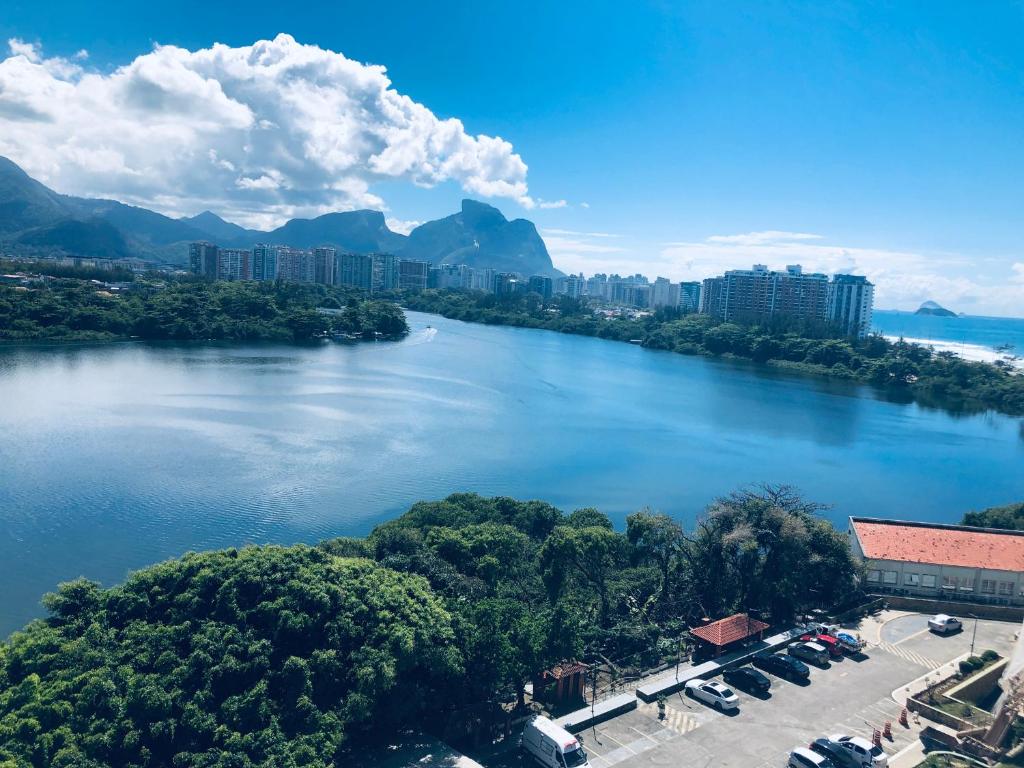 Hotel Blue House, an aerial view of a river with a city at Blue House in Rio de Janeiro