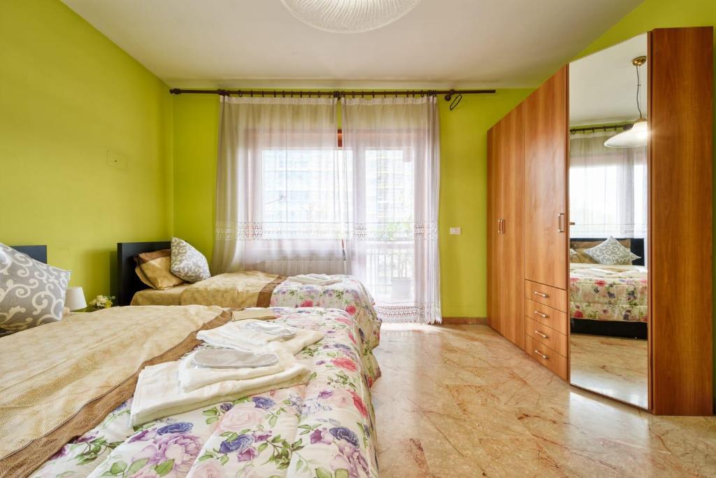 Łóżko lub łóżka w pokoju w obiekcie Venice Grand Canal Apartment