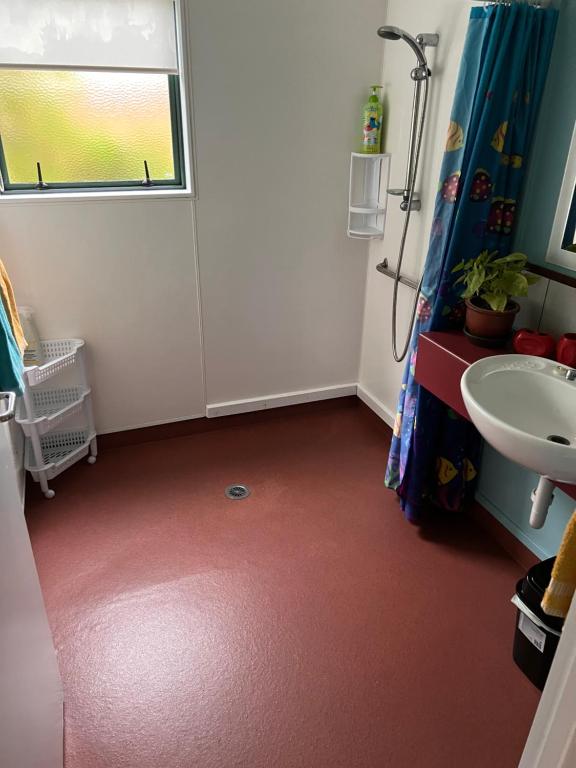Koupelna v ubytování Karikari Lodge