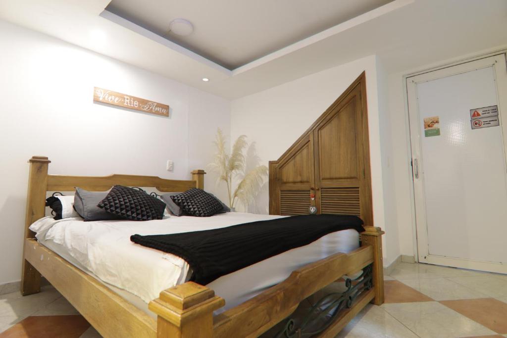 Postel nebo postele na pokoji v ubytování Hotel Casa Malibú