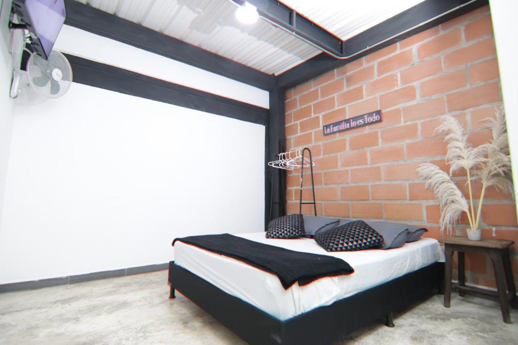 Postel nebo postele na pokoji v ubytování Hotel Casa Malibú
