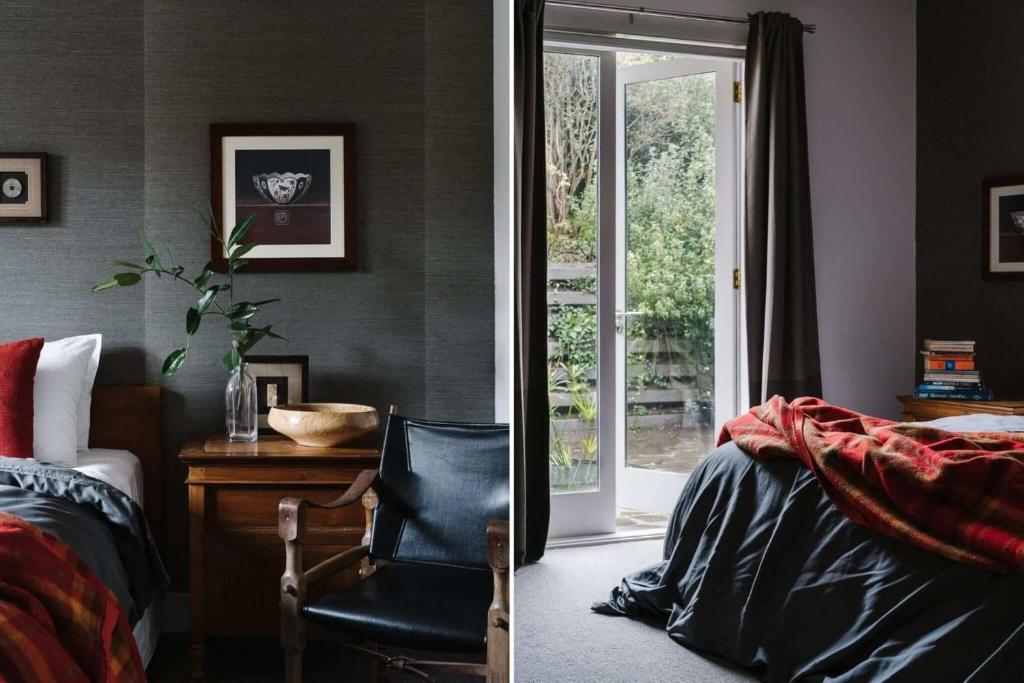 a bedroom with a bed and a desk and a chair at Cousin Gilbert Daylesford in Daylesford