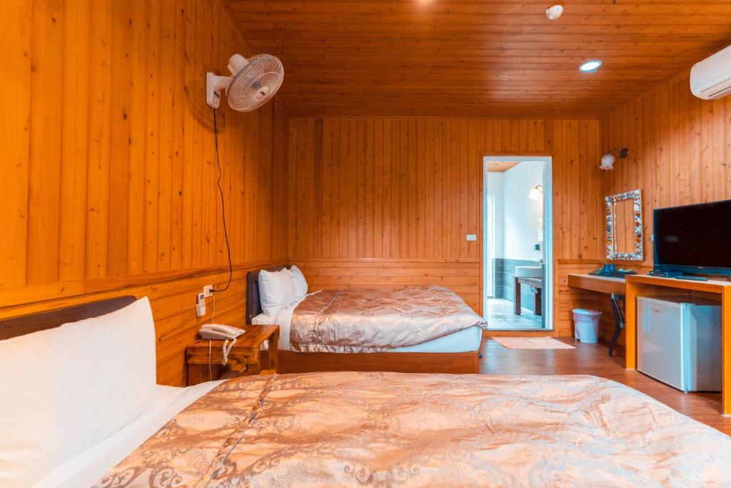 Postel nebo postele na pokoji v ubytování CDR Hotspring Resort