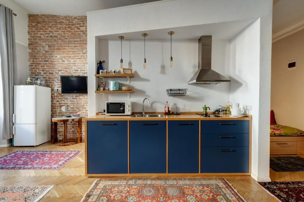 Kuchyň nebo kuchyňský kout v ubytování Apor Apartments