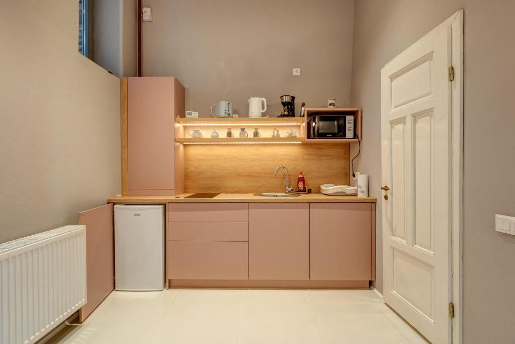 Kuchyň nebo kuchyňský kout v ubytování Apor Apartments