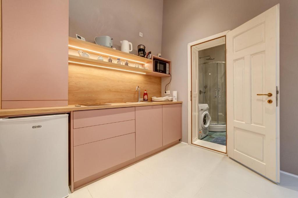Kuchyň nebo kuchyňský kout v ubytování Apor Apartments
