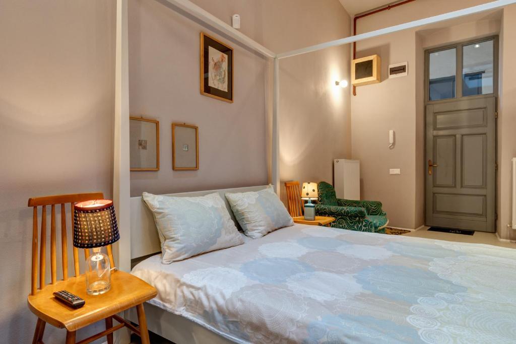 Postel nebo postele na pokoji v ubytování Apor Apartments