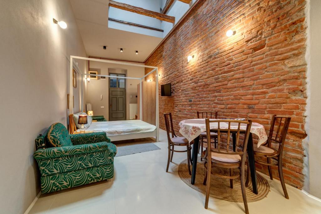 Postel nebo postele na pokoji v ubytování Apor Apartments