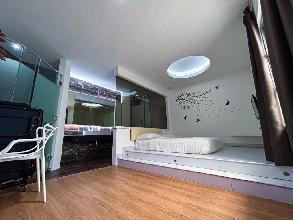 Postel nebo postele na pokoji v ubytování Cel Hotel