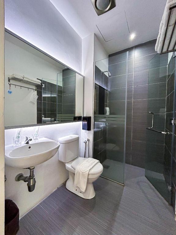 Koupelna v ubytování Cel Hotel