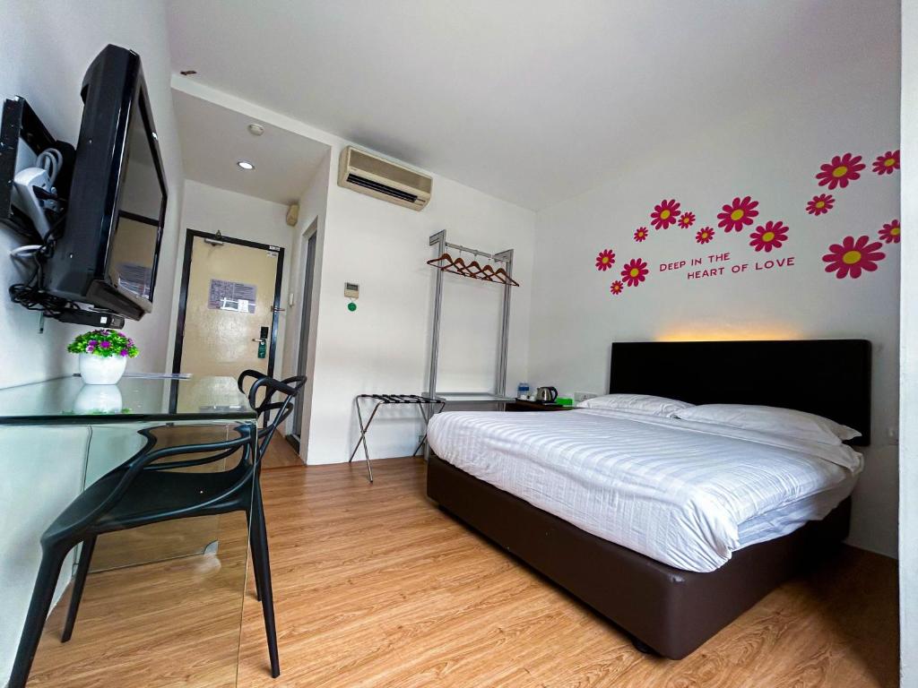 Postel nebo postele na pokoji v ubytování Cel Hotel