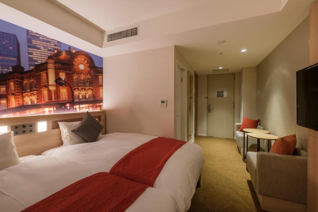 Postel nebo postele na pokoji v ubytování Hotel JAL City Haneda Tokyo West Wing
