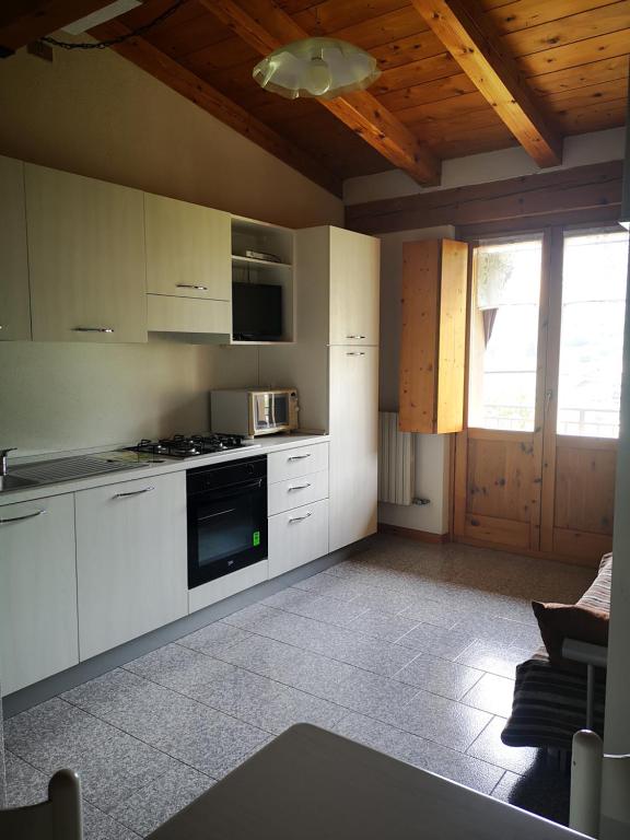 Kuchyň nebo kuchyňský kout v ubytování Giò Appartamenti Vacanze