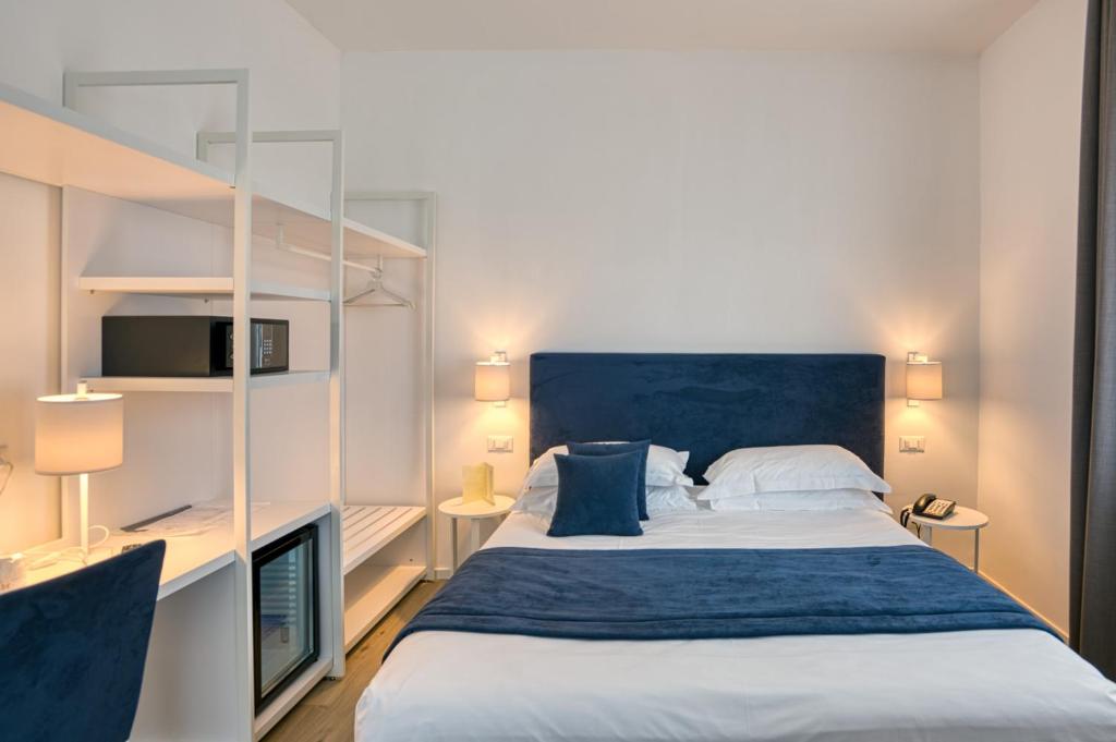 Postel nebo postele na pokoji v ubytování Hotel Isabella Sorrento