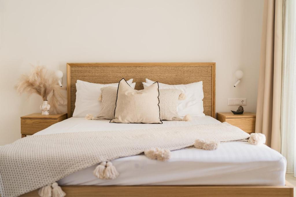 Postel nebo postele na pokoji v ubytování Magnolia Villas Thassos