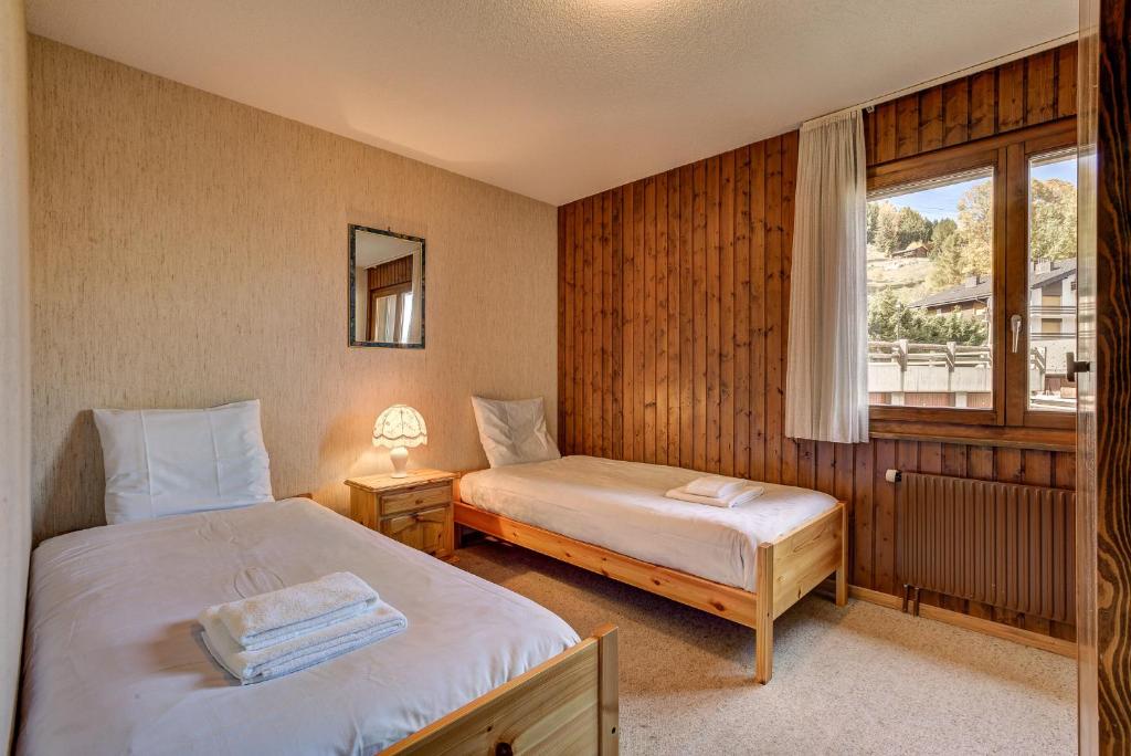 Postel nebo postele na pokoji v ubytování Appartement Valena 5