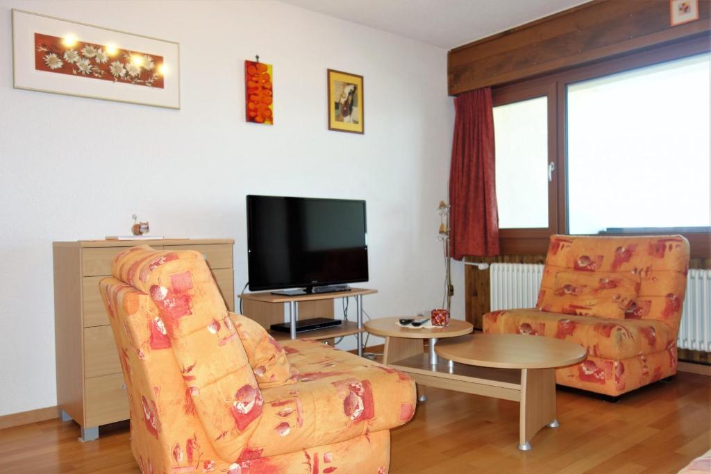 TV a/nebo společenská místnost v ubytování Magrappé MOUNTAIN & CENTER apartments