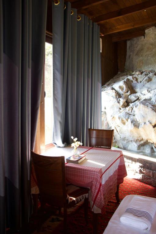 Postel nebo postele na pokoji v ubytování Hotel Iliria