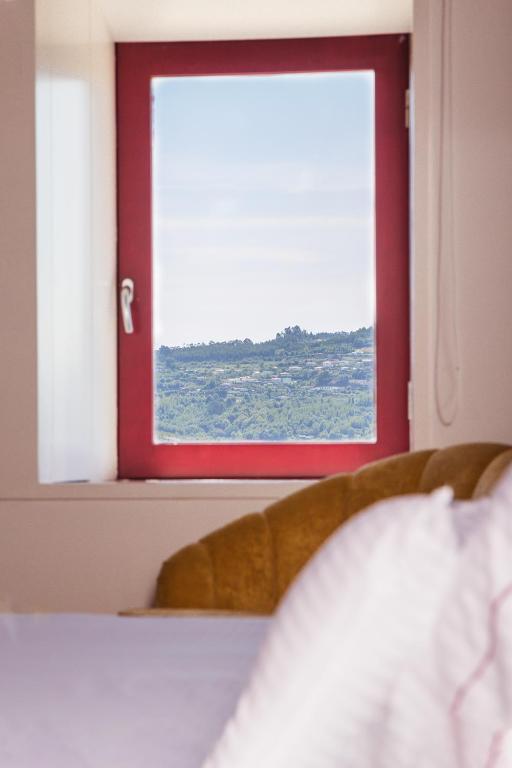 Postel nebo postele na pokoji v ubytování Quinta da Corredoura, Hotel Rural