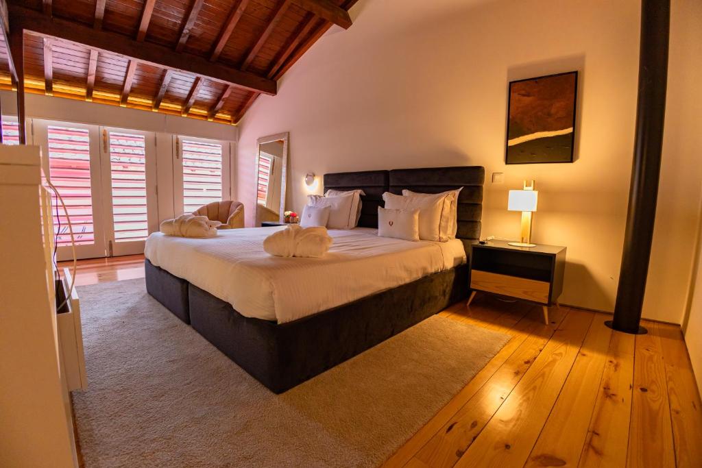 Postel nebo postele na pokoji v ubytování Quinta da Corredoura, Hotel Rural