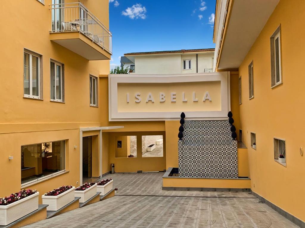 a building with a sign that reads isabella at Hotel Isabella Sorrento in Sorrento