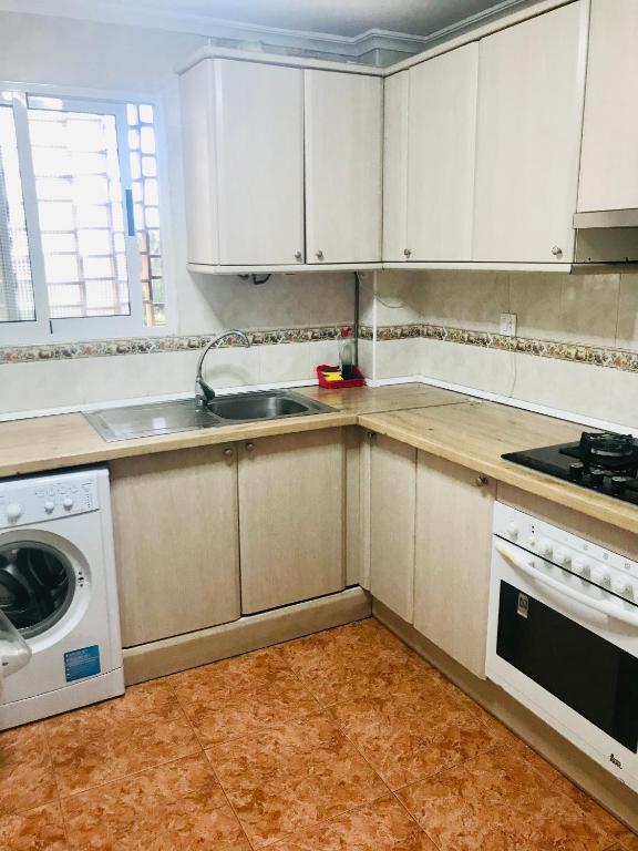 Kuchyň nebo kuchyňský kout v ubytování Piso Alicante