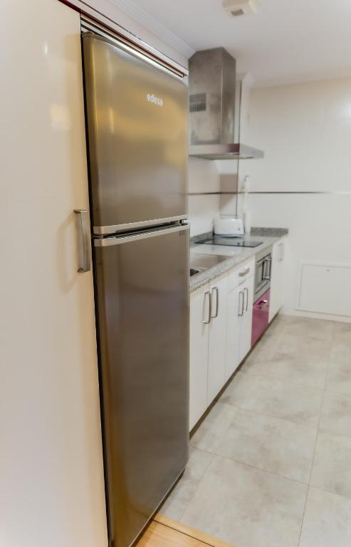 Kuchyňa alebo kuchynka v ubytovaní Apartamentos & casas rurales Santo Domingo de Silos