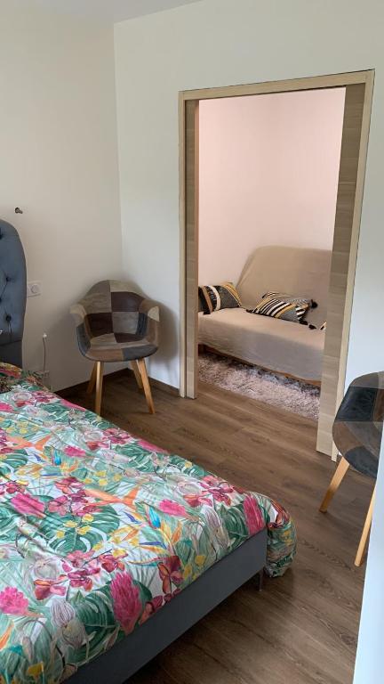 Postel nebo postele na pokoji v ubytování Belle suite parentale
