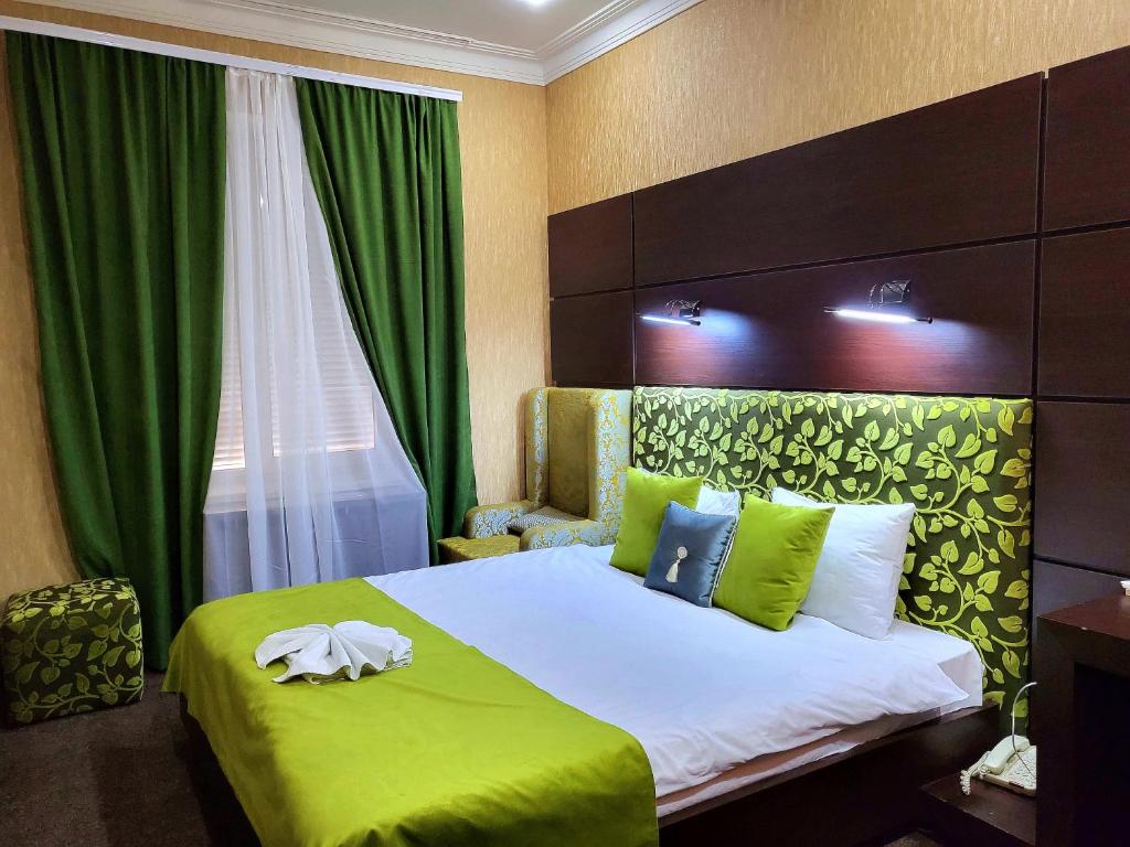 Кровать или кровати в номере Отель Максим-Паша