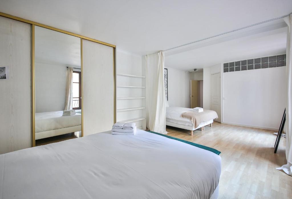 Posteľ alebo postele v izbe v ubytovaní 22#Appartement 6Pers#Sèvres-Lecourbe#Necker