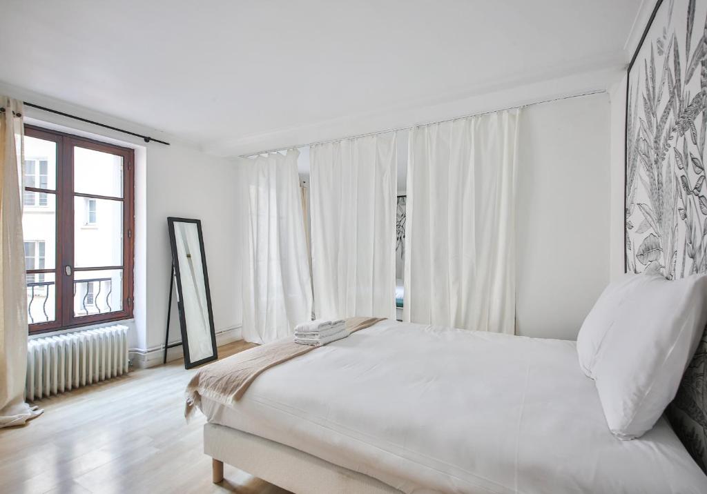 Posteľ alebo postele v izbe v ubytovaní 22#Appartement 6Pers#Sèvres-Lecourbe#Necker
