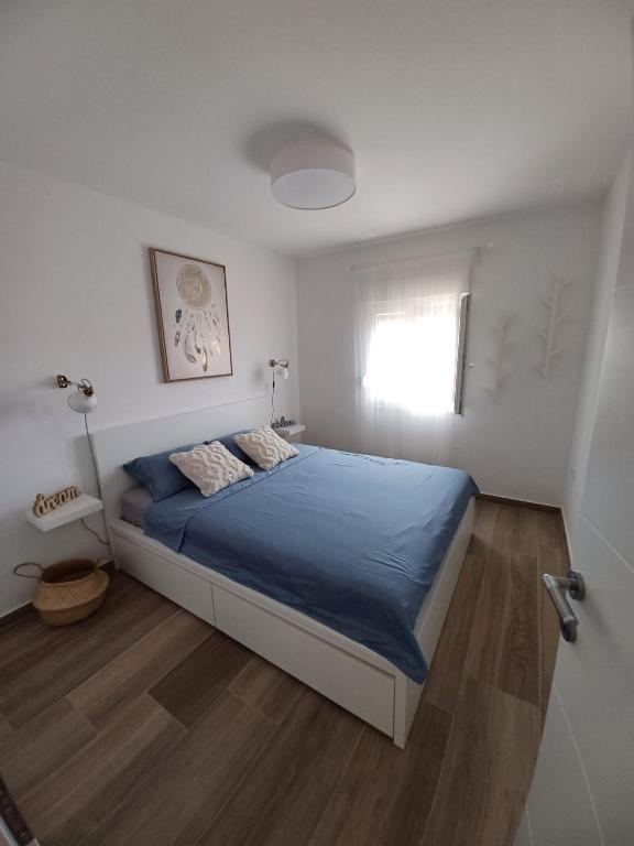 Postel nebo postele na pokoji v ubytování Apartments Sava