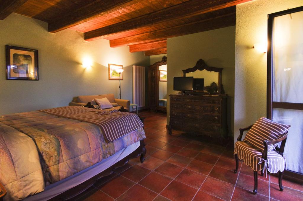 Postel nebo postele na pokoji v ubytování B&B il Baciass