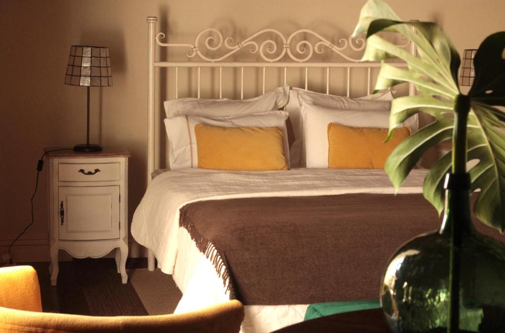 Postel nebo postele na pokoji v ubytování Villa Várzea - Charming Suite