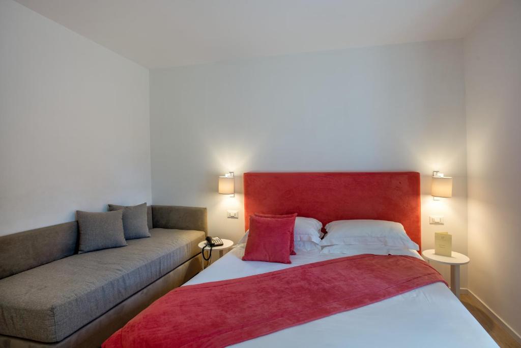 Postel nebo postele na pokoji v ubytování Hotel Isabella Sorrento