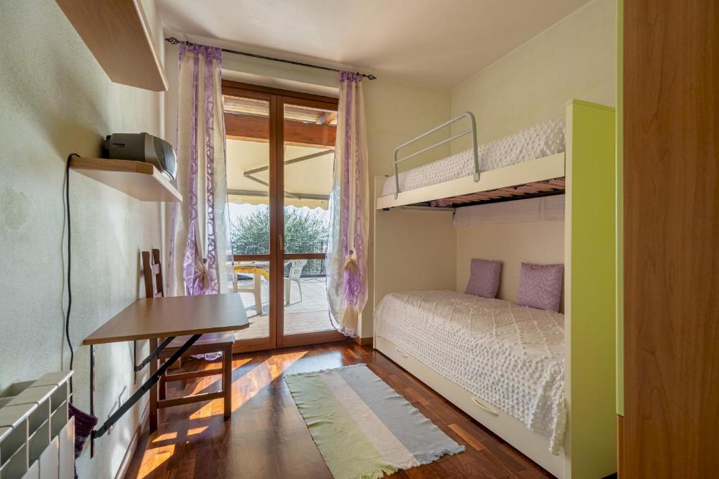 Posteľ alebo postele v izbe v ubytovaní La casa di Sarah