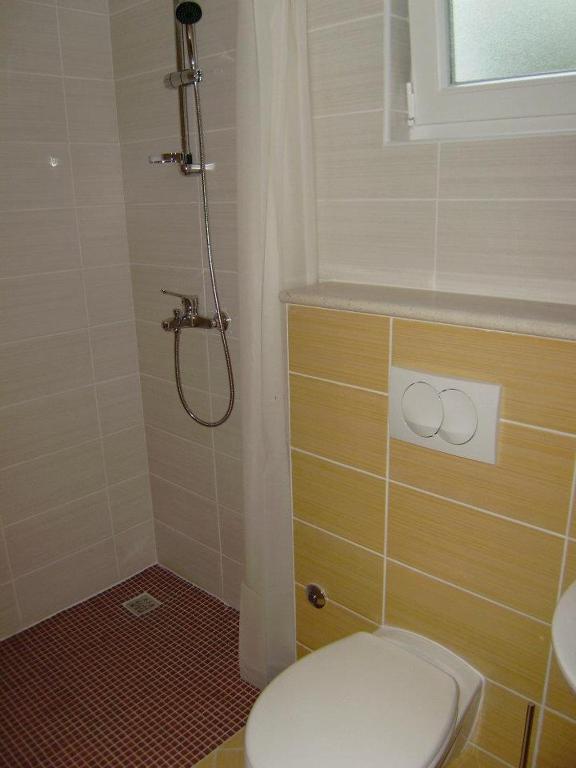 Koupelna v ubytování Apartments Kvesic