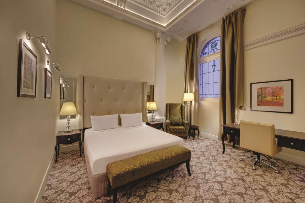 Postel nebo postele na pokoji v ubytování Rendezvous Hotel Melbourne
