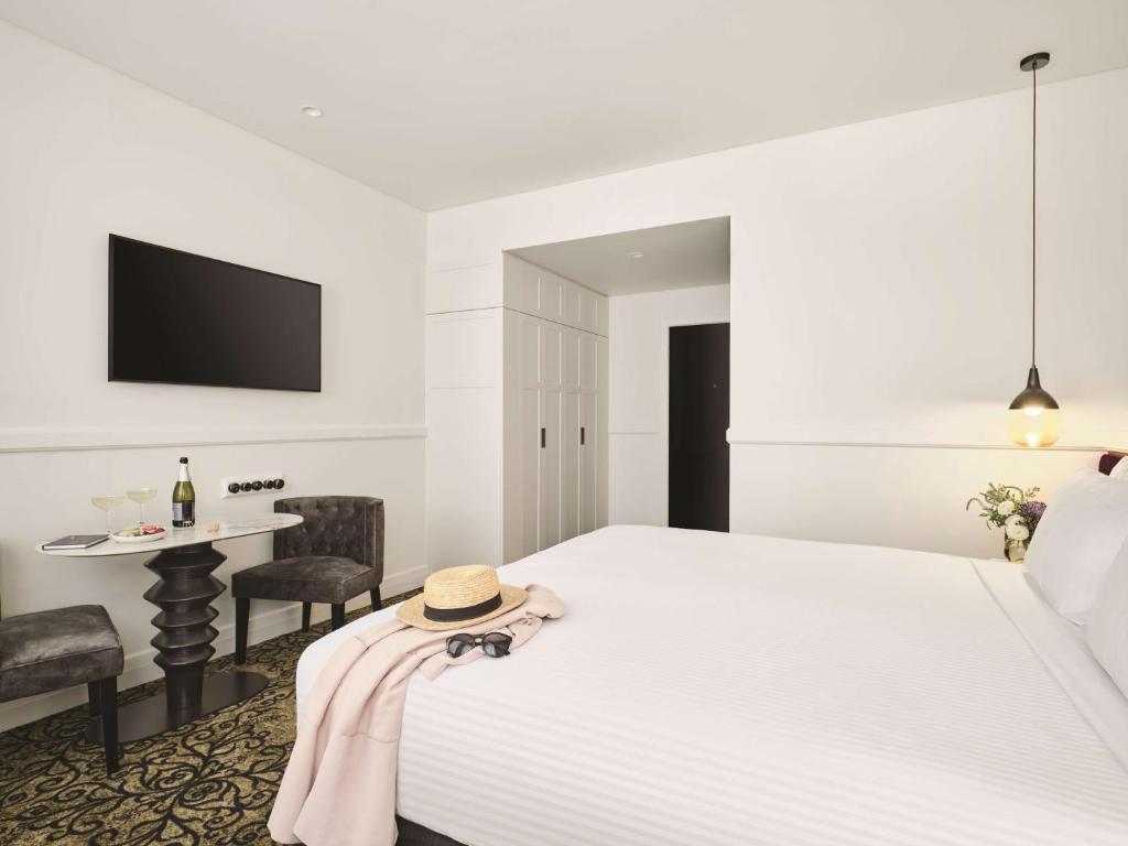 TV a/nebo společenská místnost v ubytování Rendezvous Hotel Melbourne