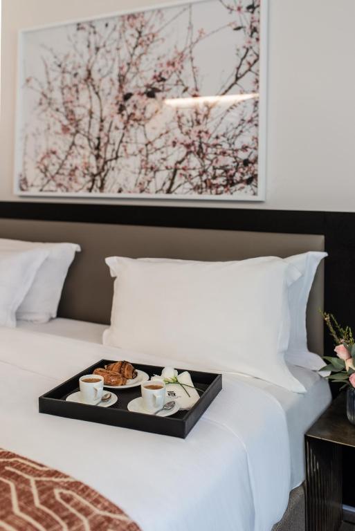 Postel nebo postele na pokoji v ubytování Dan Jerusalem Hotel