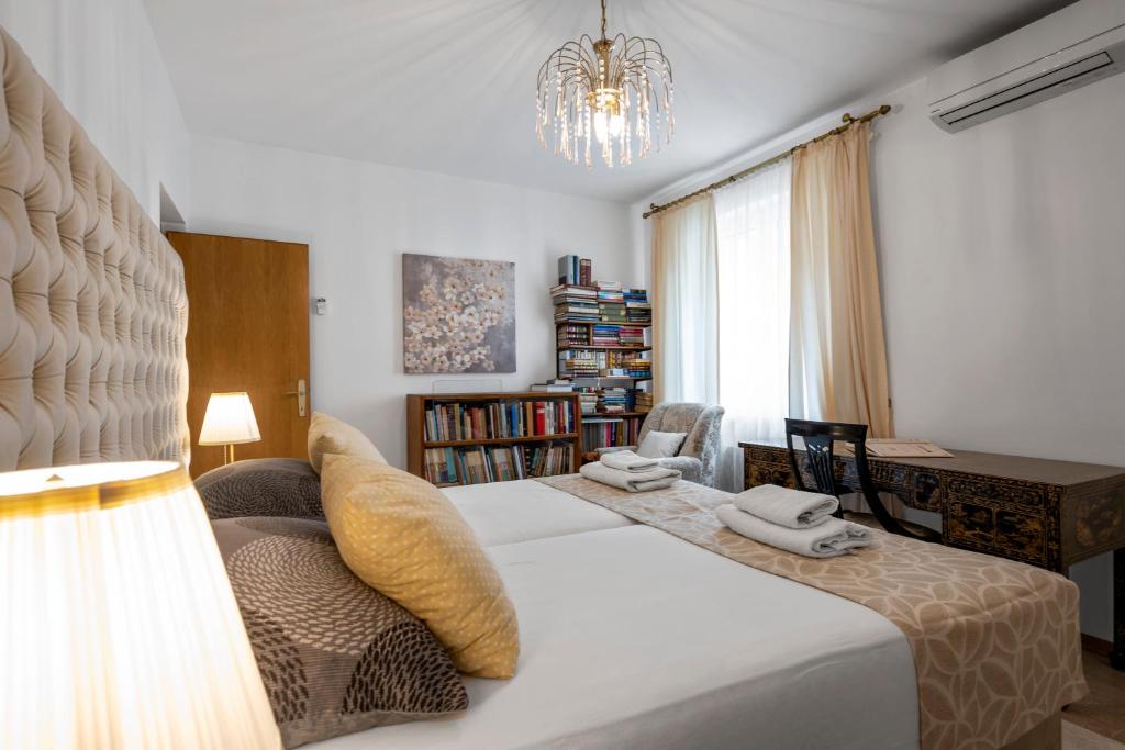 Posteľ alebo postele v izbe v ubytovaní Apartment Sinjorina Leticia