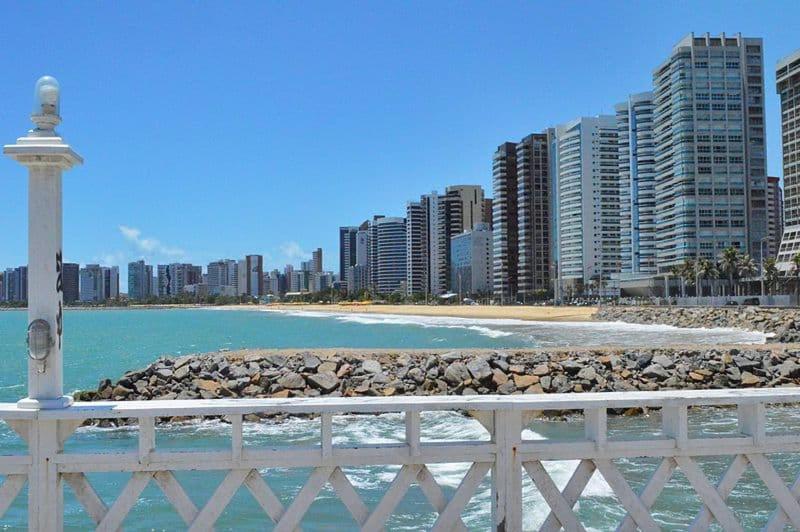 a view of a beach with buildings and the ocean at Pousada Dragao Do Mar in Fortaleza