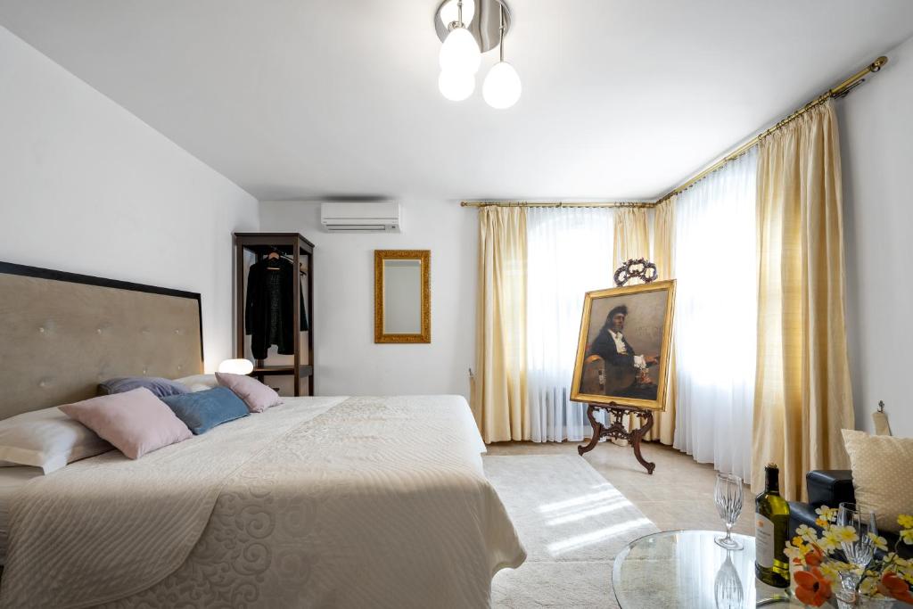 Posteľ alebo postele v izbe v ubytovaní Apartment Sinjorina Leticia