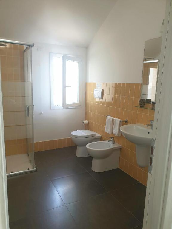 Koupelna v ubytování Hotel Grel